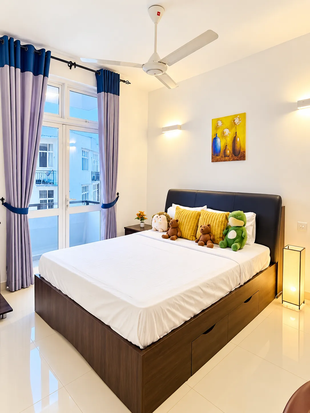 Bright bedroom with a double bed at The Residence by Hanz