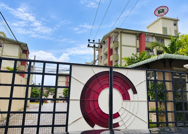 Residence security gate and apartment building